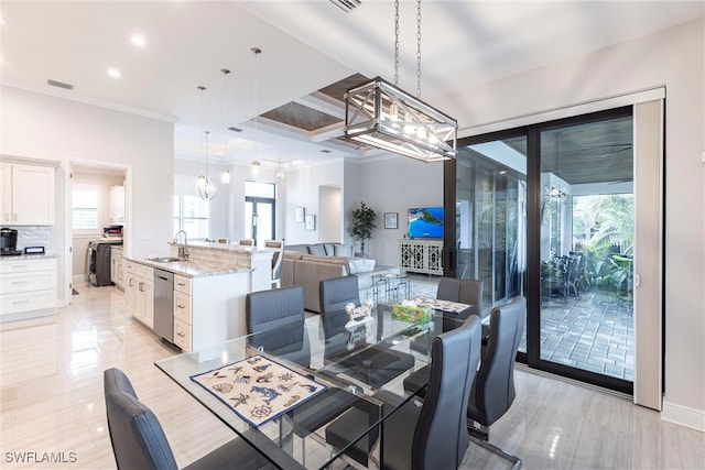 dining space with a chandelier, healthy amount of natural light, coffered ceiling, crown molding, and beam ceiling
