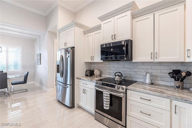 kitchen with stainless steel appliances, decorative backsplash, baseboards, light stone counters, and ornamental molding