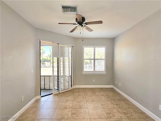3290 37th Ave NE, Naples, FL 34120 - empty room featuring a ceiling fan, baseboards, and light tile patterned floors