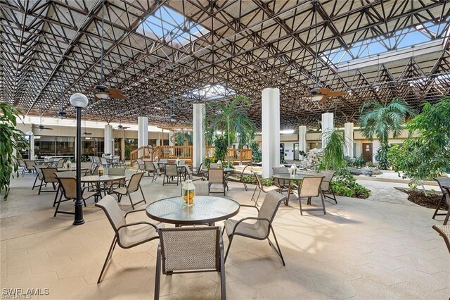 1740 Pine Valley Dr Unit 211, Fort Myers, FL 33907 - view of patio / terrace with a pergola