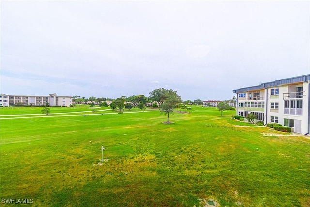1740 Pine Valley Dr Unit 211, Fort Myers, FL 33907 - view of property's community with a yard and golf course view
