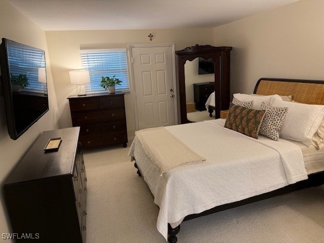 2880 Gulf Shore Blvd N Unit 404, Naples, FL 34103 - bedroom with light colored carpet