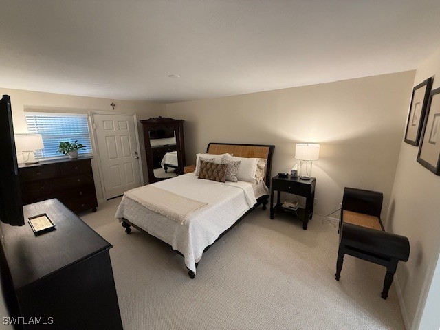 2880 Gulf Shore Blvd N Unit 404, Naples, FL 34103 - bedroom with light colored carpet