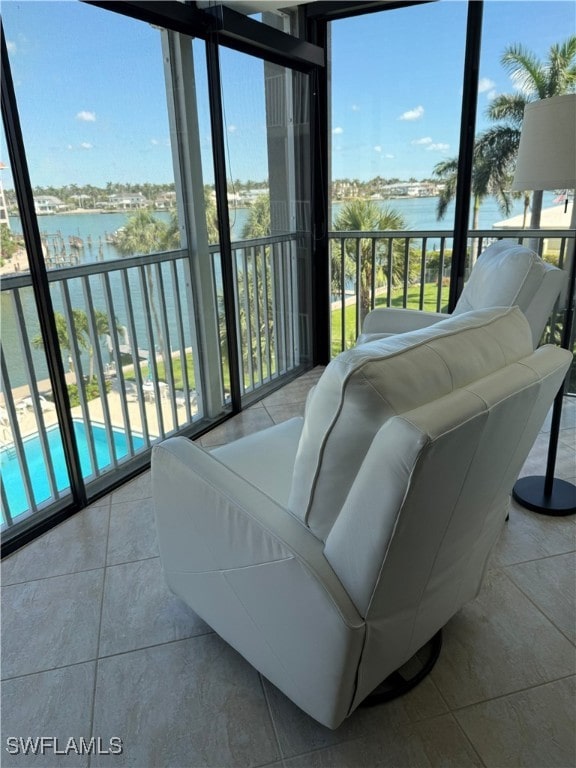 2880 Gulf Shore Blvd N Unit 404, Naples, FL 34103 - tiled bedroom with a water view and multiple windows