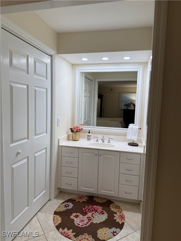 2880 Gulf Shore Blvd N Unit 404, Naples, FL 34103 - bathroom featuring vanity, tile patterned flooring, and recessed lighting