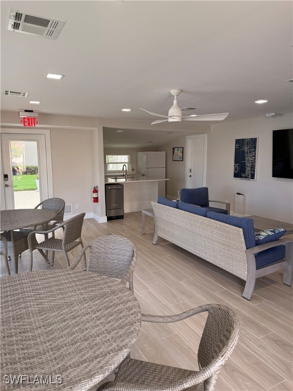2880 Gulf Shore Blvd N Unit 404, Naples, FL 34103 - living room featuring recessed lighting, ceiling fan, and light wood-style floors