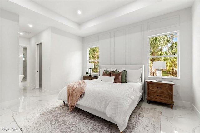 bedroom featuring marble finish flooring, baseboards, and recessed lighting