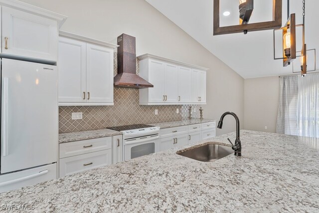 2124 SE 10th Ln, Cape Coral, FL 33990 - kitchen with white appliances, a sink, wall chimney range hood, tasteful backsplash, and lofted ceiling