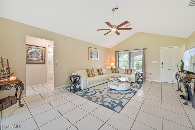 27006 Elaine Dr, Bonita Springs, FL 34135 - living room with ceiling fan, light tile patterned flooring, baseboards, and high vaulted ceiling