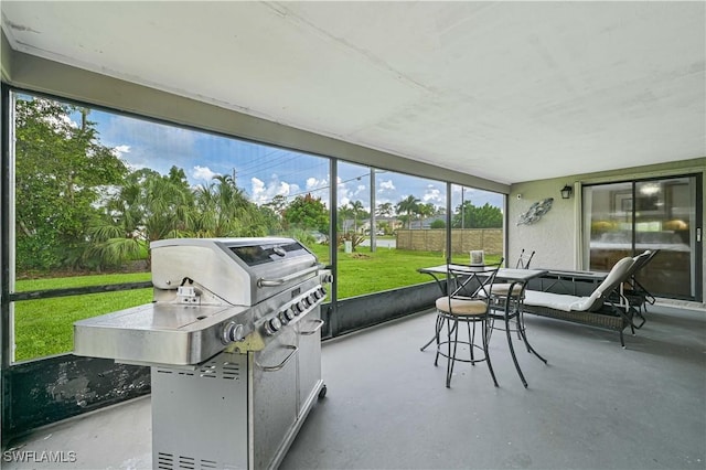 27006 Elaine Dr, Bonita Springs, FL 34135 - sunroom with outdoor dining space