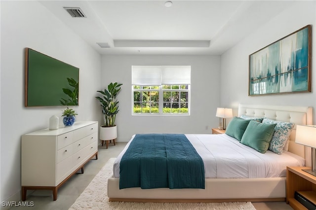 26380 Coco Cay Cir Unit 101, Bonita Springs, FL 34135 - bedroom featuring a tray ceiling