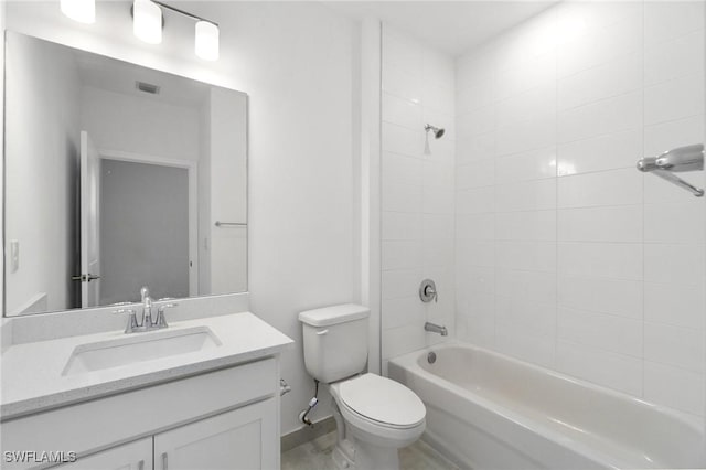 26380 Coco Cay Cir Unit 101, Bonita Springs, FL 34135 - full bathroom featuring toilet, vanity, and washtub / shower combination