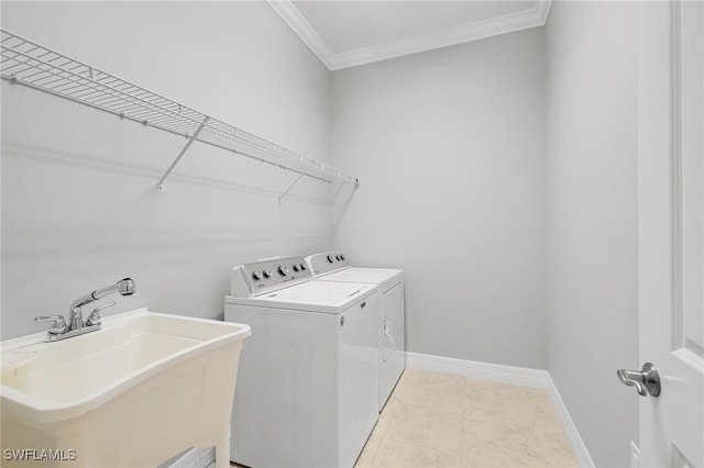 11810 Timbermarsh Ct, Fort Myers, FL 33913 - laundry room with washing machine and clothes dryer, crown molding, and baseboards