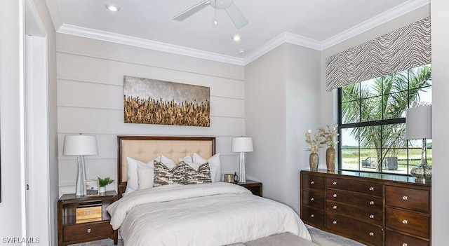 bedroom with crown molding and ceiling fan
