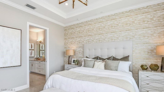 bedroom with crown molding, ensuite bathroom, baseboards, a sink, and a tray ceiling