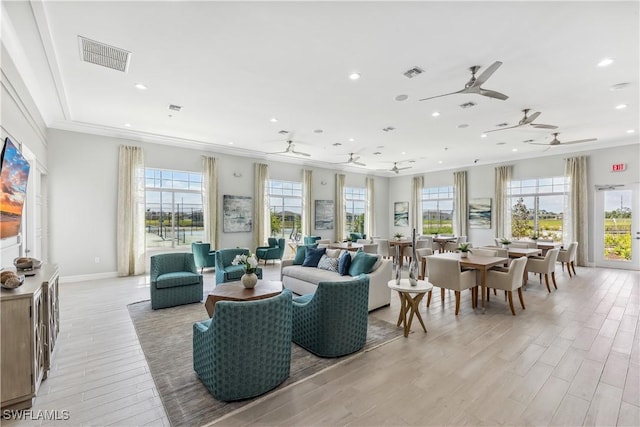 16515 Fire Coral Ln, North Fort Myers, FL 33903 - living room featuring light wood-style floors, recessed lighting, crown molding, baseboards, and a ceiling fan
