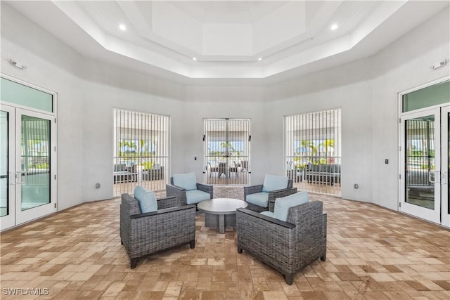 16515 Fire Coral Ln, North Fort Myers, FL 33903 - sitting room with a high ceiling, french doors, a raised ceiling, and recessed lighting