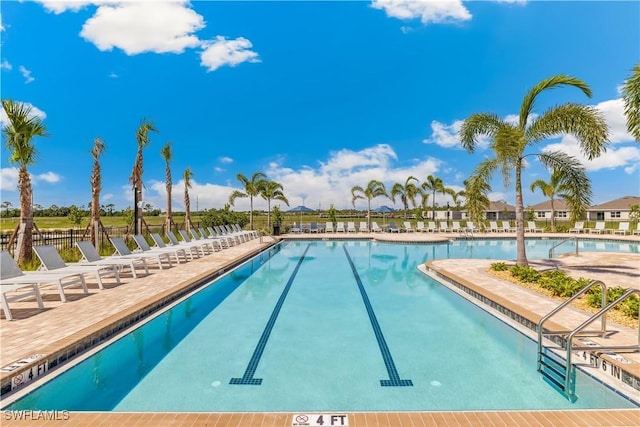16515 Fire Coral Ln, North Fort Myers, FL 33903 - community pool featuring a patio
