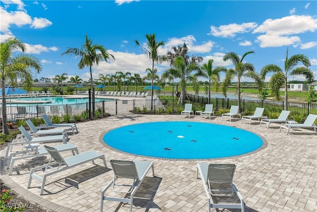 16515 Fire Coral Ln, North Fort Myers, FL 33903 - community pool with a patio area