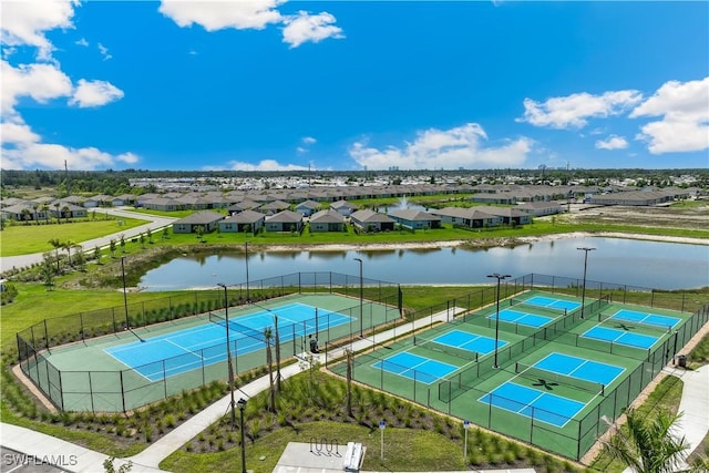 16515 Fire Coral Ln, North Fort Myers, FL 33903 - aerial perspective of suburban area with a nearby body of water