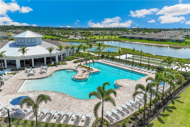 16515 Fire Coral Ln, North Fort Myers, FL 33903 - community pool with a residential view, a patio, and a water view