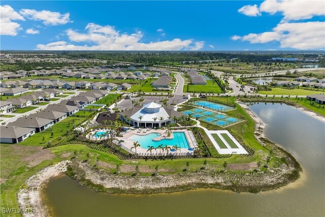 16515 Fire Coral Ln, North Fort Myers, FL 33903 - aerial view of residential area with a pool and a large body of water
