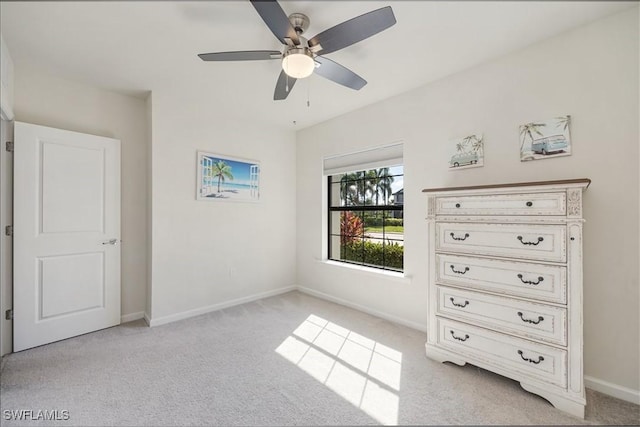 4969 Seton St, Ave Maria, FL 34142 - unfurnished bedroom with light colored carpet, baseboards, and ceiling fan