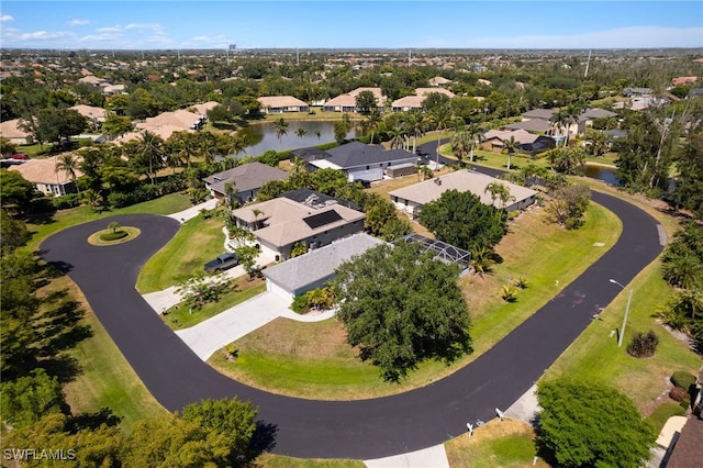 8970 Woodgate Manor Ct, Fort Myers, FL 33908 - aerial view of residential area with a large body of water