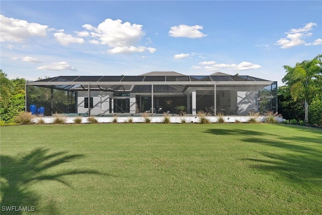15392 Old Pine Ct, Fort Myers, FL 33912 - rear view of property featuring a yard and glass enclosure