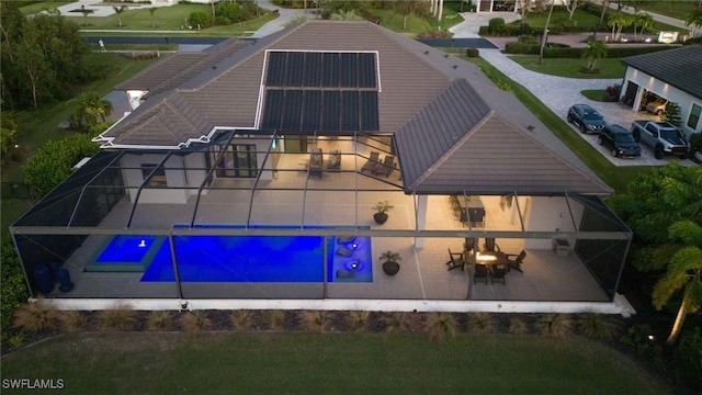 15392 Old Pine Ct, Fort Myers, FL 33912 - back of house with an outdoor pool and a patio area
