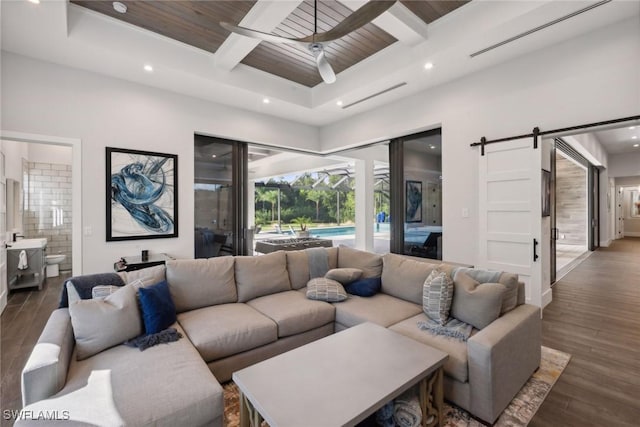 15392 Old Pine Ct, Fort Myers, FL 33912 - living area featuring a barn door, wood finished floors, recessed lighting, wood ceiling with exposed beams, and coffered ceiling