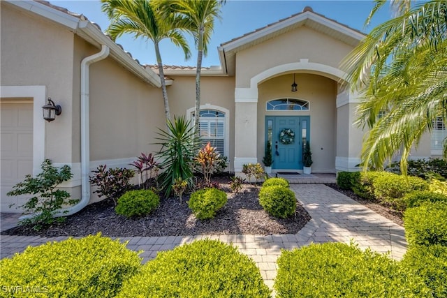 16112 Cutters Ct, Fort Myers, FL 33908 - doorway to property with stucco siding
