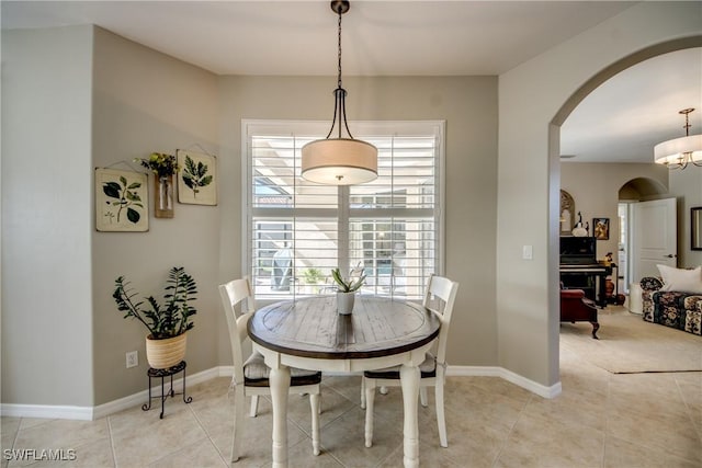 16112 Cutters Ct, Fort Myers, FL 33908 - tiled dining area with arched walkways and baseboards