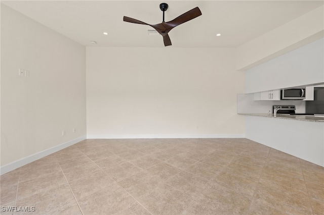 17307 Timber Oak Ln, Fort Myers, FL 33908 - unfurnished living room with ceiling fan, recessed lighting, baseboards, a sink, and light tile patterned flooring