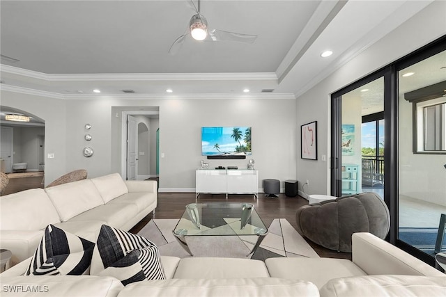 4750 Via Del Corso Ln Unit 201, Bonita Springs, FL 34134 - living room with arched walkways, wood finished floors, a raised ceiling, recessed lighting, and crown molding