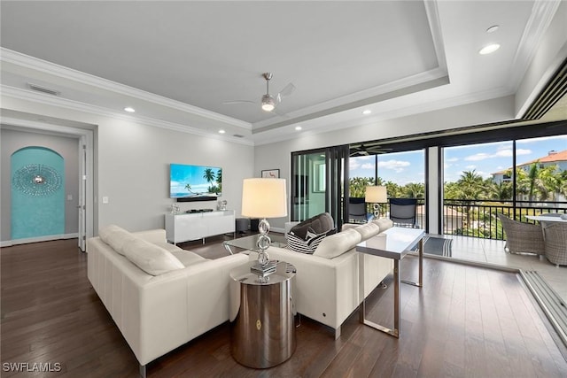 4750 Via Del Corso Ln Unit 201, Bonita Springs, FL 34134 - living area featuring a tray ceiling, ceiling fan, dark wood finished floors, crown molding, and recessed lighting