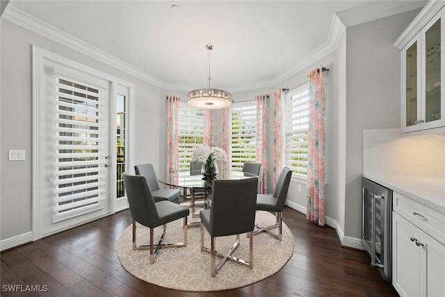 4750 Via Del Corso Ln Unit 201, Bonita Springs, FL 34134 - dining space featuring wine cooler, dark wood-style flooring, ornamental molding, baseboards, and a dry bar