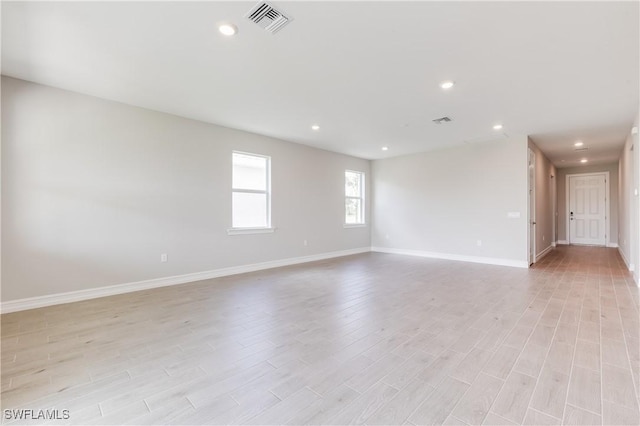 16811 Elkhorn Coral Dr, North Fort Myers, FL 33903 - unfurnished room with light wood-style flooring and recessed lighting