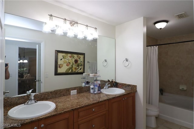 20321 Estero Gardens Cir Unit 108, Estero, FL 33928 - bathroom featuring double vanity, toilet, shower / bath combination with curtain, and tile patterned flooring