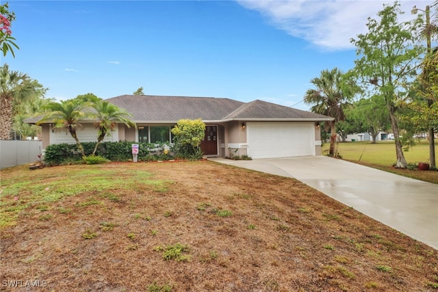940 Golden Gate Blvd W, Naples, FL 34120 - ranch-style home featuring an attached garage, driveway, and stucco siding