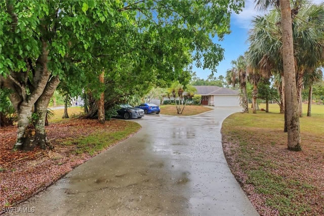 940 Golden Gate Blvd W, Naples, FL 34120 - view of front of property with concrete driveway and a front yard