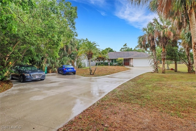 940 Golden Gate Blvd W, Naples, FL 34120 - view of front of house featuring driveway and a front yard