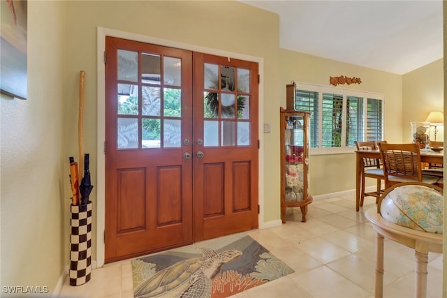 940 Golden Gate Blvd W, Naples, FL 34120 - entrance foyer featuring french doors, baseboards, and light tile patterned floors
