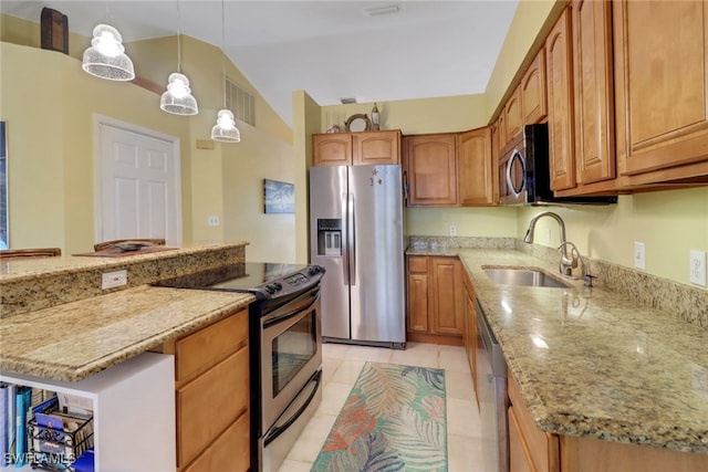 940 Golden Gate Blvd W, Naples, FL 34120 - kitchen featuring appliances with stainless steel finishes, a sink, light stone countertops, lofted ceiling, and decorative light fixtures