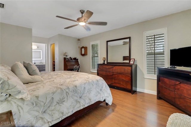 940 Golden Gate Blvd W, Naples, FL 34120 - bedroom with wood finished floors, baseboards, and ceiling fan