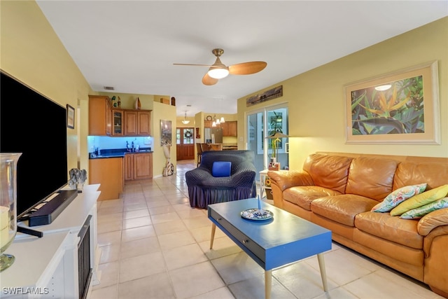 940 Golden Gate Blvd W, Naples, FL 34120 - living area with a ceiling fan and light tile patterned floors