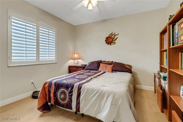 940 Golden Gate Blvd W, Naples, FL 34120 - bedroom featuring wood finished floors, baseboards, and a ceiling fan