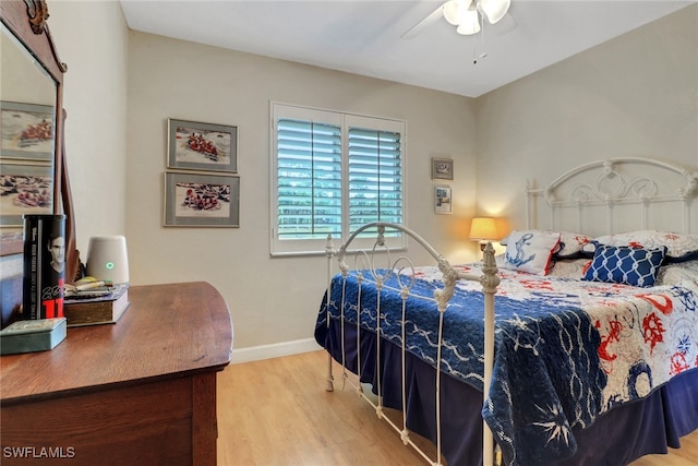 940 Golden Gate Blvd W, Naples, FL 34120 - bedroom with wood finished floors, baseboards, and ceiling fan