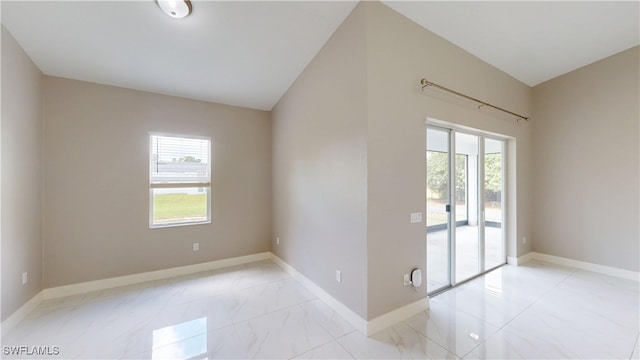 2505 4th St SW, Lehigh Acres, FL 33976 - unfurnished room with marble finish floors and baseboards