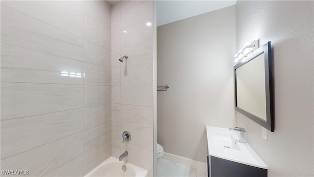 2505 4th St SW, Lehigh Acres, FL 33976 - full bathroom with toilet, bathtub / shower combination, vanity, and baseboards